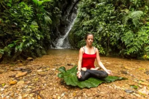A serene meditation session in the tranquil surroundings of Mashpi Lodge, where the natural harmony of Ecuador's cloud forest promotes wellness.